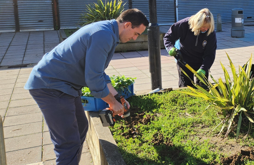 Ed and Valerie hard at work with the planters in Dean Parade