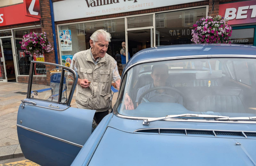 Ed inside a vintage Vauxhall