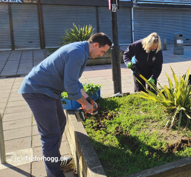 Ed and Valerie hard at work with the planters in Dean Parade