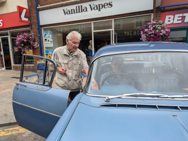 Ed inside a vintage Vauxhall